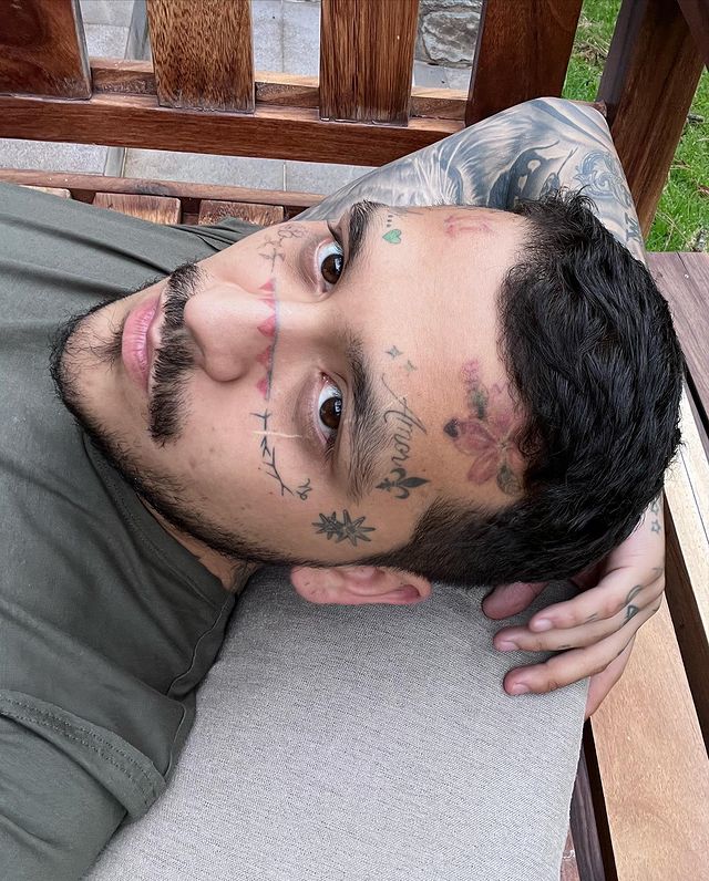 nodal cara tatuajes