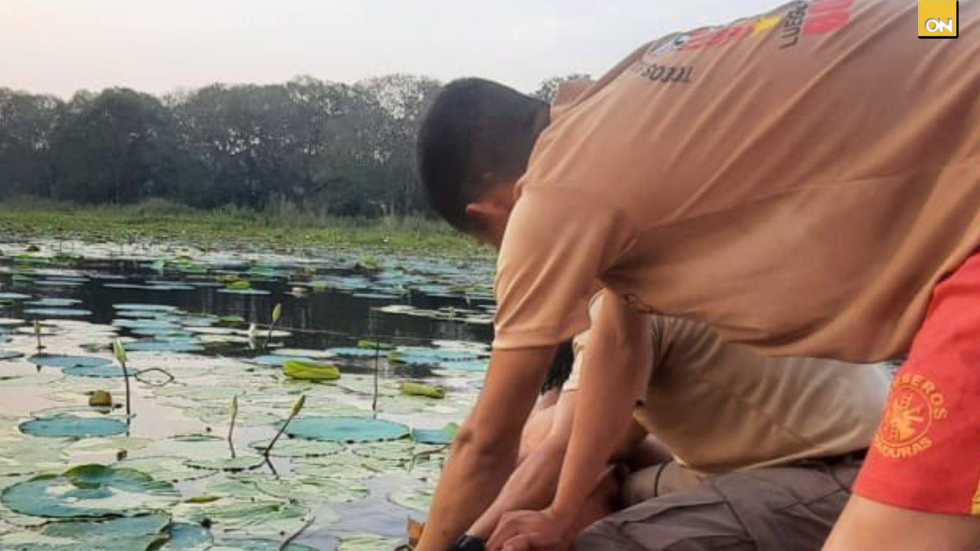 Jóvenes pescadores lago Yojoa